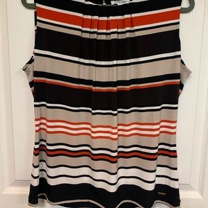 Calvin Klein top, size XL, made in Jordan